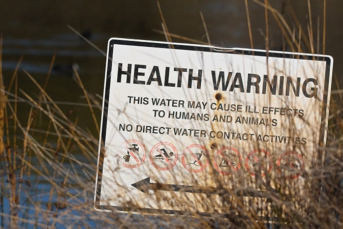 health warning sign about water