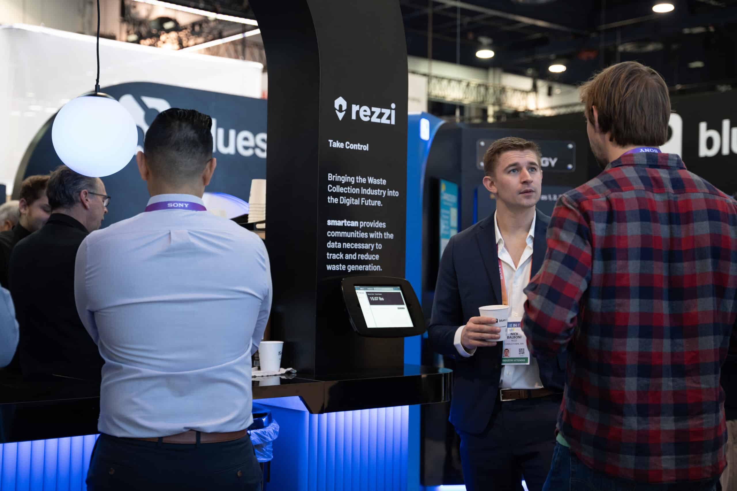 Rezzi displaying their SmartCan technology with Blues at CES 2023.